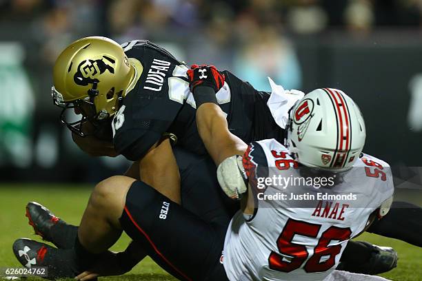 Defensive end Bradlee Anae of the Utah Utes sacks quarterback Sefo Liufau of the Colorado Buffaloes during the first quarter at Folsom Field on...