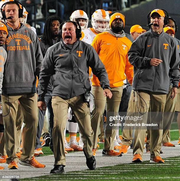 Head coach Butch Jones yells during the second half of a game against the Vanderbilt Commodores at Vanderbilt Stadium on November 26, 2016 in...