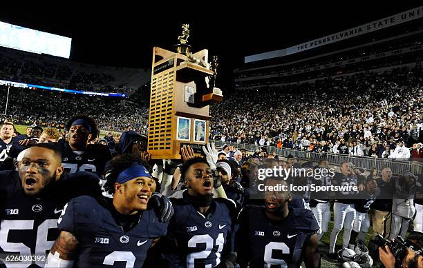 Penn State's Tyrell Chavis , Sterling Jenkins , S Marcus Allen , CB Amani Oruwariye , and S Malik Golden celebrates with the Land Grant Land-Grant...
