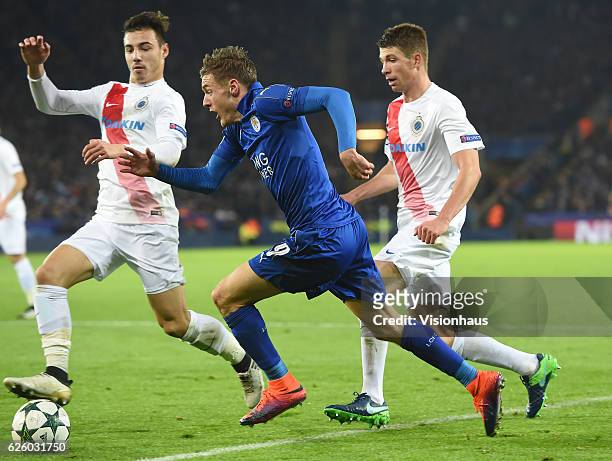 Jamie Vardy of Leicester City FC and Brandon Mechele and Dion Cools of Club Brugge KV during the UEFA Champions League match between Leicester City...