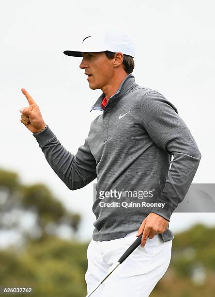 Thorbjorn Olesen of Denmark celebrates a birdie during day four of the World Cup of Golf at Kingston Heath Golf Club on November 27, 2016 in...