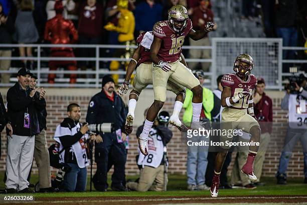 Florida State Seminoles wide receiver Auden Tate celebrates with Florida State Seminoles wide receiver Travis Rudolph after a touchdown during the...