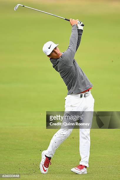 Thorbjorn Olesen of Denmark plays an approach shot during day four of the World Cup of Golf at Kingston Heath Golf Club on November 27, 2016 in...
