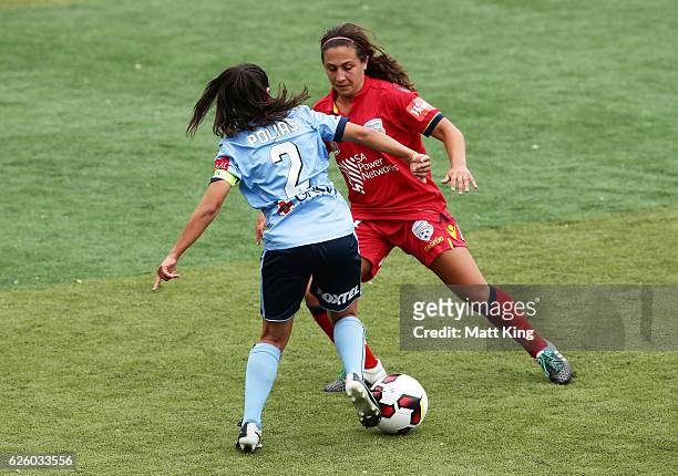 Teresa Polias of Sydney FC is challenged by Danielle Colaprico of United during the round four W-League match between Sydney FC and Adelaide United...