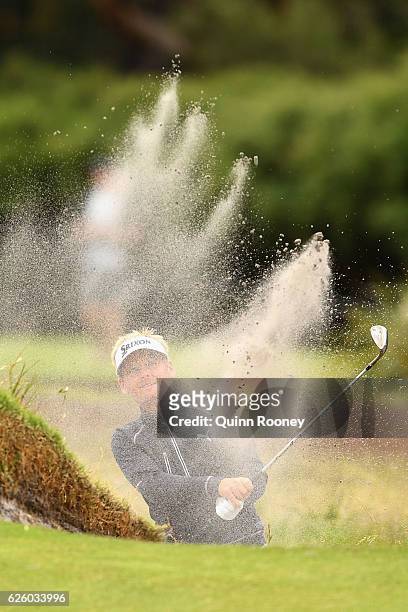 Soren Kjeldsen of Denmark plays out of the bunker during day four of the World Cup of Golf at Kingston Heath Golf Club on November 27, 2016 in...
