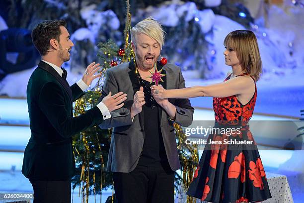 Florian Silbereisen, Ross Antony and Francine Jordi are seen on stage during the tv show 'Das Adventsfest der 100.000 Lichter' on November 26, 2016...