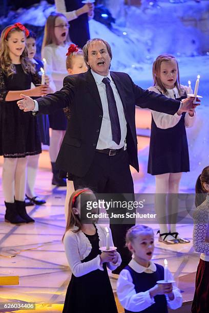 Chris de Burgh is seen on stage during the tv show 'Das Adventsfest der 100.000 Lichter' on November 26, 2016 in Suhl, Germany.
