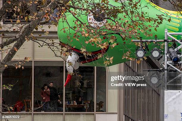 Happy Dragon balloon floats at the 90th annual Macy's Thanksgiving Day Parade near to Bryant Park ice rink on November 24, 2016 in New York City.