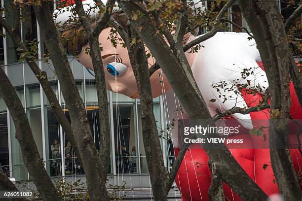 The Elf on The Shelf balloon floats at the 90th annual Macy's Thanksgiving Day Parade near to Bryant Park ice rink on November 24, 2016 in New York...