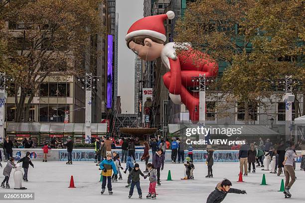 The Elf on The Shelf balloon floats at the 90th annual Macy's Thanksgiving Day Parade near to Bryant Park ice rink on November 24, 2016 in New York...