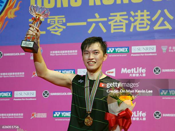 Ng Ka Long Angus poses with his trophy after defeating Sameer Verma of India at the Men's Single Final at Yonex-Sunrise Hong Kong Open Championships...