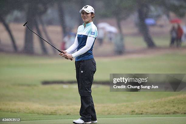 Ayaka Watanabe of Japan reacts after a putt on the 9th green during the final round of the LPGA Tour Championship Ricoh Cup 2016 at the Miyazaki...