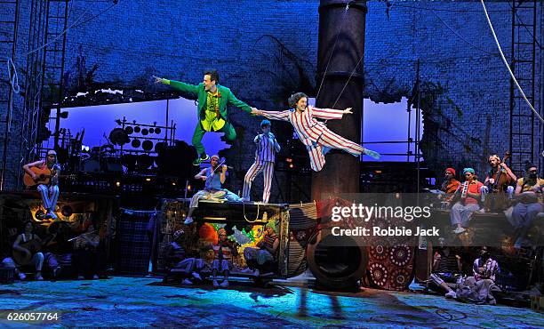 Paul Hilton as Peter Pan and Madeleine Worrall as Wendy with artists of the company in the National Theatre/Bristol Old Vic production of JM Barrie's...