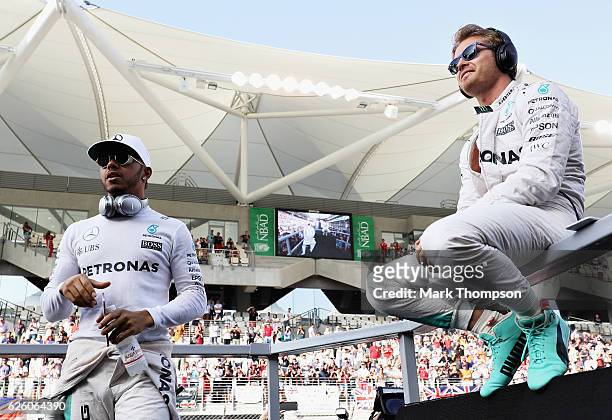 World Drivers Championship contenders Lewis Hamilton of Great Britain and Mercedes GP and Nico Rosberg of Germany and Mercedes GP on the drivers...