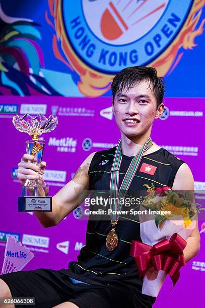 Ng Ka Long Angus of Hong Kong celebrating with his trophy after defeating Sameer Verma of India in their Men's Singles Final during the YONEX-SUNRISE...