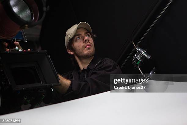 film crew - film director stock pictures, royalty-free photos & images