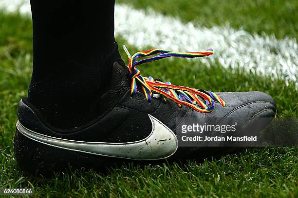 Rainbow laces are seen on officlas boots during the Premier League match between Watford and Stoke City at Vicarage Road on November 27, 2016 in...