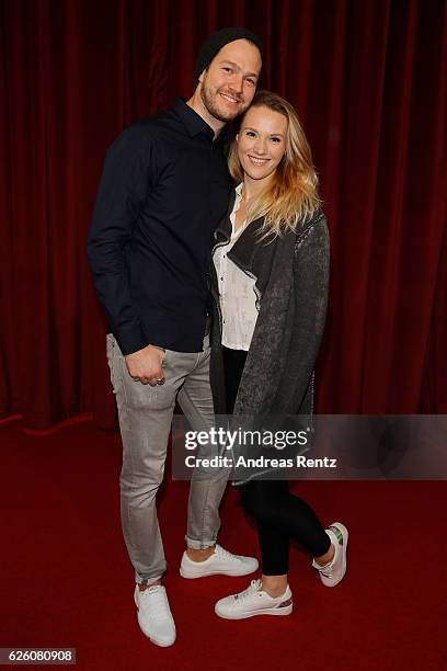 Anna Hofbauer and partner Marvin Albrecht attend the European premiere of 'Sing' at Cinedom on November 27, 2016 in Cologne, Germany.