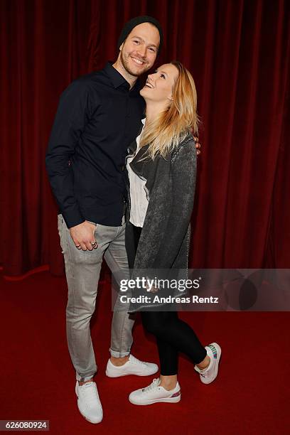 Anna Hofbauer and partner Marvin Albrecht attend the European premiere of 'Sing' at Cinedom on November 27, 2016 in Cologne, Germany.