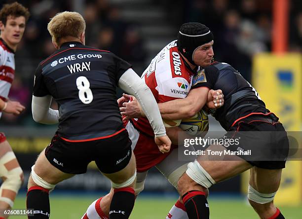 Kelly Brown of Saracens tackles Ben Morgan of Gloucester Rugby during the Aviva Premiership match between Saracens and Gloucester Rugby at Allianz...