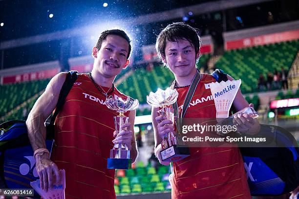 Takeshi Kamura and Keigo Sonoda of Japan celebrating after winning Mathias Boe and Carsten Mogensen of Denmark on their Men's Doubles Final of...