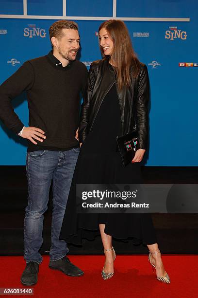 Klaas Heufer-Umlauf and Alexandra Maria Lara attend the European premiere of 'Sing' at Cinedom on November 27, 2016 in Cologne, Germany.