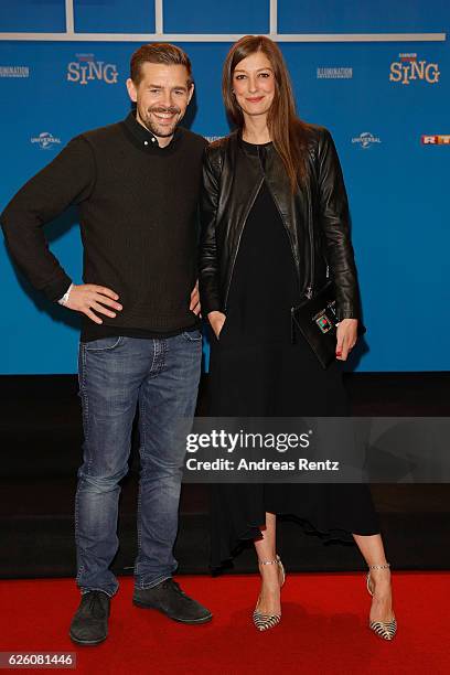 Klaas Heufer-Umlauf and Alexandra Maria Lara attend the European premiere of 'Sing' at Cinedom on November 27, 2016 in Cologne, Germany.