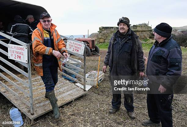 Competitors register their entry during the annual ploughing match on November 27, 2016 in Staithes, United Kingdom. The event which is held each...