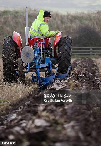 Angus Grey from Darlington is the youngest competitior in the annual ploughing match on November 27, 2016 in Staithes, United Kingdom. The event...