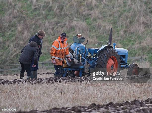 Competitor checks the straightness of his furrows during the annual ploughing match on November 27, 2016 in Staithes, United Kingdom. The event which...