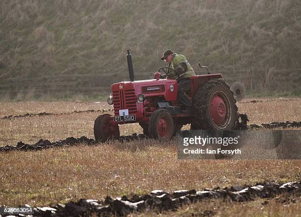 Gordon Sumley from Scarborough drives his McCormick International tractor as he competes during the annual ploughing match on November 27, 2016 in...