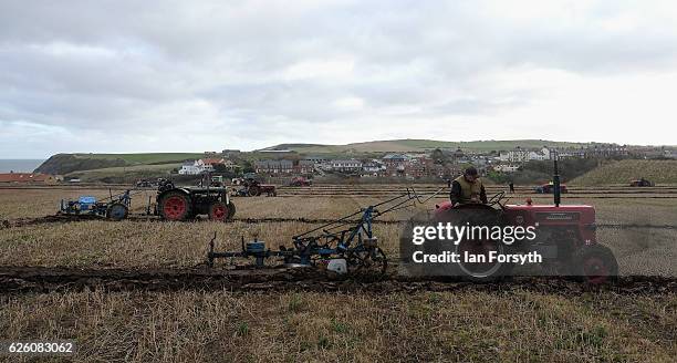 Competitors take part in the annual ploughing match on November 27, 2016 in Staithes, United Kingdom. The event which is held each year in fields...