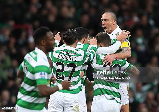 Tom Rogic of Celtic is congratulated by team mates after he scores true opening goal during the Betfred Cup Final between Aberdeen and Celtic at...