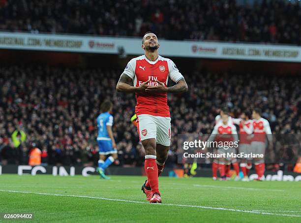 Theo Walcott celebrates scoring the 2nd Arsenal goal during the Premier League match between Arsenal and AFC Bournemouth at Emirates Stadium on...