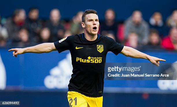 Kevin Gameiro of Atletico Madrid celebrates after scoring his team's second goal during the La Liga match between CA Osasuna and Atletico Madrid at...