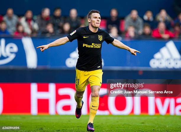 Kevin Gameiro of Atletico Madrid celebrates after scoring his team's second goal during the La Liga match between CA Osasuna and Atletico Madrid at...