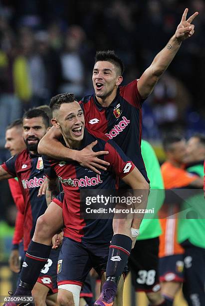 Lucas Ocampos and Giovanni Simeone of Genoa CFC celebrate a victory at the end of the Serie A match between Genoa CFC and Juventus FC at Stadio Luigi...