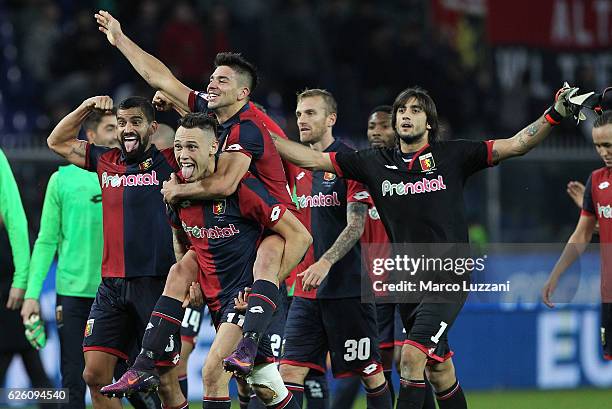 Lucas Ocampos and Giovanni Simeone of Genoa CFC celebrate a victory at the end of the Serie A match between Genoa CFC and Juventus FC at Stadio Luigi...