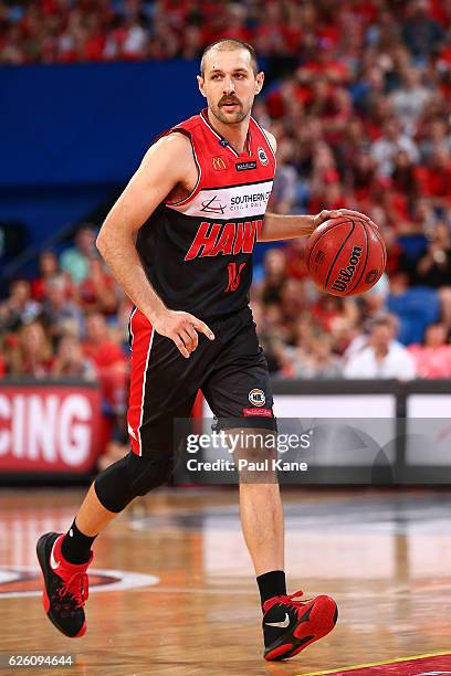 Rhys Martin of the Hawks dribbles the ball up the court during the round eight NBL match between the Perth Wildcats and the Illawarra Hawks at the...