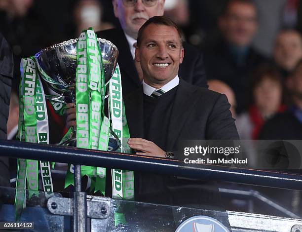 Celtic manager Brendan Rogers lifts the trophy during the Betfred Cup Final between Aberdeen and Celtic at Hampden Park on November 27, 2016 in...