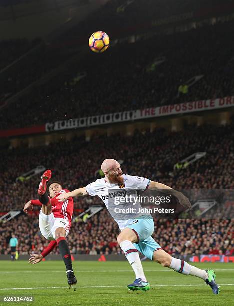 Jesse Lingard of Manchester United in action with James Collins of West Ham United during the Premier League match between Manchester United and West...