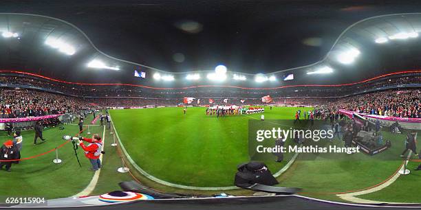 Muenchen and Leverkusen players line up prior to the Bundesliga match between Bayern Muenchen and Bayer 04 Leverkusen at Allianz Arena on November...