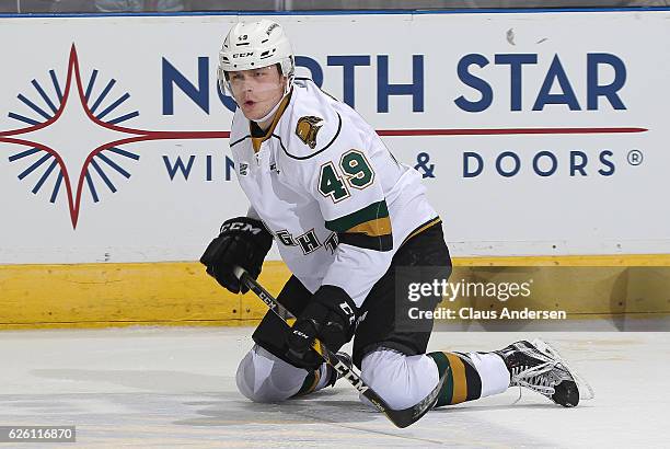 Max Jones of the London Knights gets to his feet against the Barrie Colts during an OHL game at Budweiser Gardens on November 25, 2016 in London,...