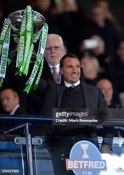 Celtic manager Brendan Rodgers lifts the trophy as Celtic win the Betfred Cup Final between Aberdeen FC and Celtic FC at Hampden Park on November 27,...