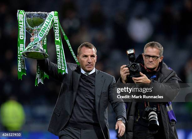 Celtic manager Brendan Rodgers lifts the trophy as Celtic win the Betfred Cup Final between Aberdeen FC and Celtic FC at Hampden Park on November 27,...