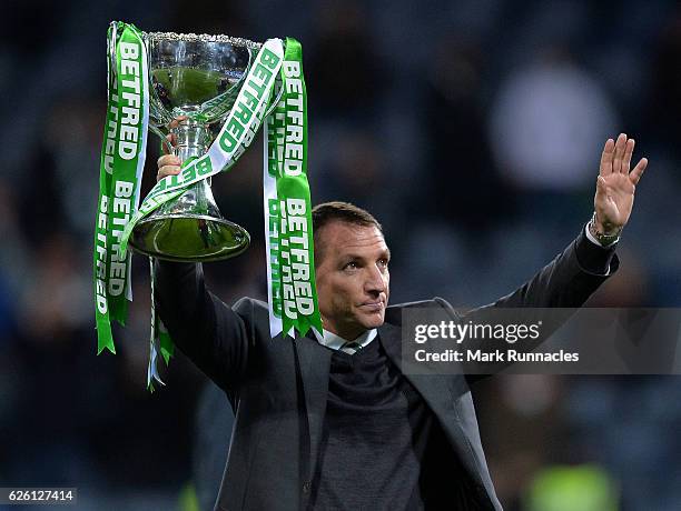 Celtic manager Brendan Rodgers lifts the trophy as Celtic win the Betfred Cup Final between Aberdeen FC and Celtic FC at Hampden Park on November 27,...