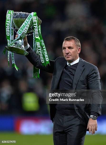 Celtic manager Brendan Rodgers lifts the trophy as Celtic win the Betfred Cup Final between Aberdeen FC and Celtic FC at Hampden Park on November 27,...