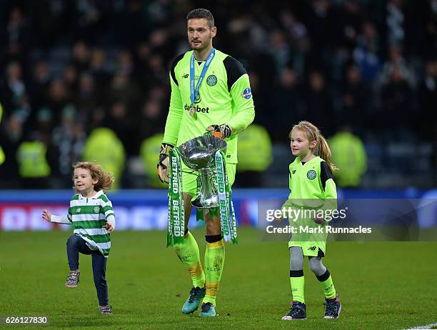 Craig Gordon of Celtic celebrates with his children as Celtic win the Betfred Cup Final between Aberdeen FC and Celtic FC at Hampden Park on November...