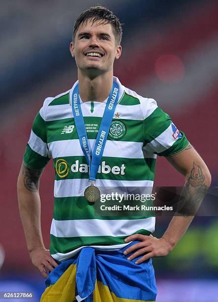 Mikael Lustig of Celtic celebrates as Celtic win the Betfred Cup Final between Aberdeen FC and Celtic FC at Hampden Park on November 27, 2016 in...