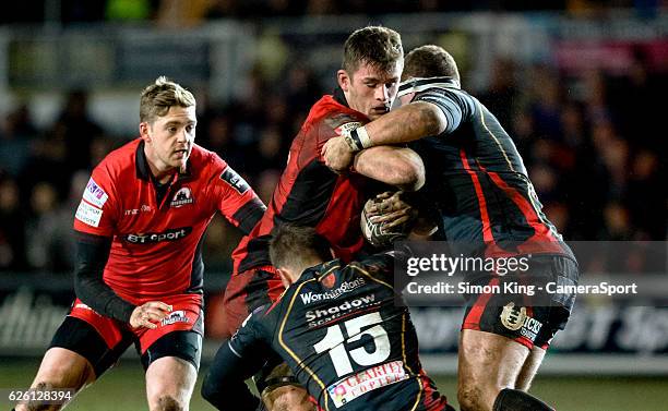 Edinburgh's Magnus Bradbury under pressure from Newport Gwent Dragons' Carl Meyer during the Guinness PRO12 Round 9 match between Newport Gwent...